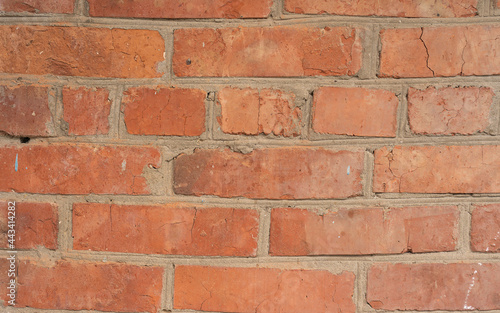 brick red wall background of a old brick house