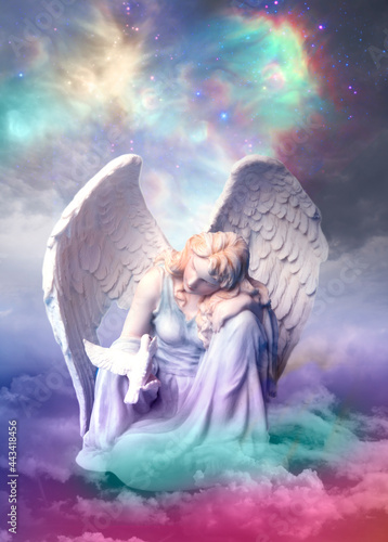 beautiful angel archangel over mystic sky with galaxy and stars background and with copy space and rainbow pastel colors  photo