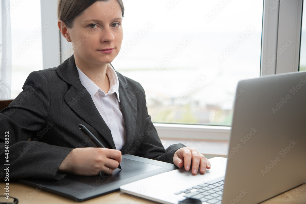 Woman working with the computer as a designer, get sad thinking expression. The problem at work. Overworked depressed female. Woman working with the computer as a designer, get sad thinking expression. The problem at work. Overworked depressed female.