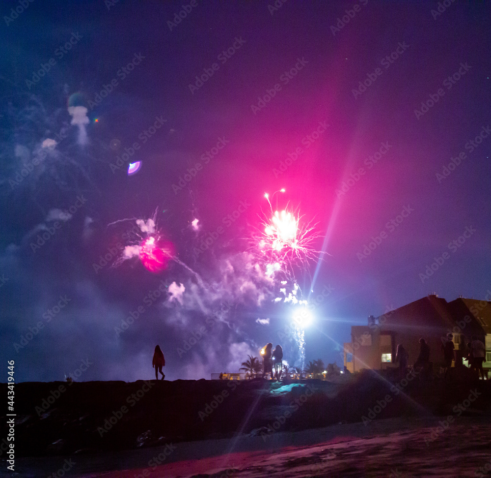 Fireworks over the jetty on a summer night in Manasquan, New Jersey.