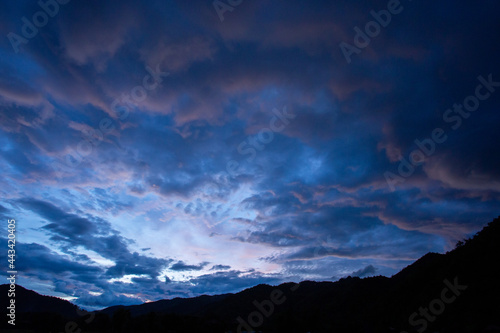 mountain silhouette landscape blue sky clouds after the evening rain Beautiful evening sky images for a blue background.