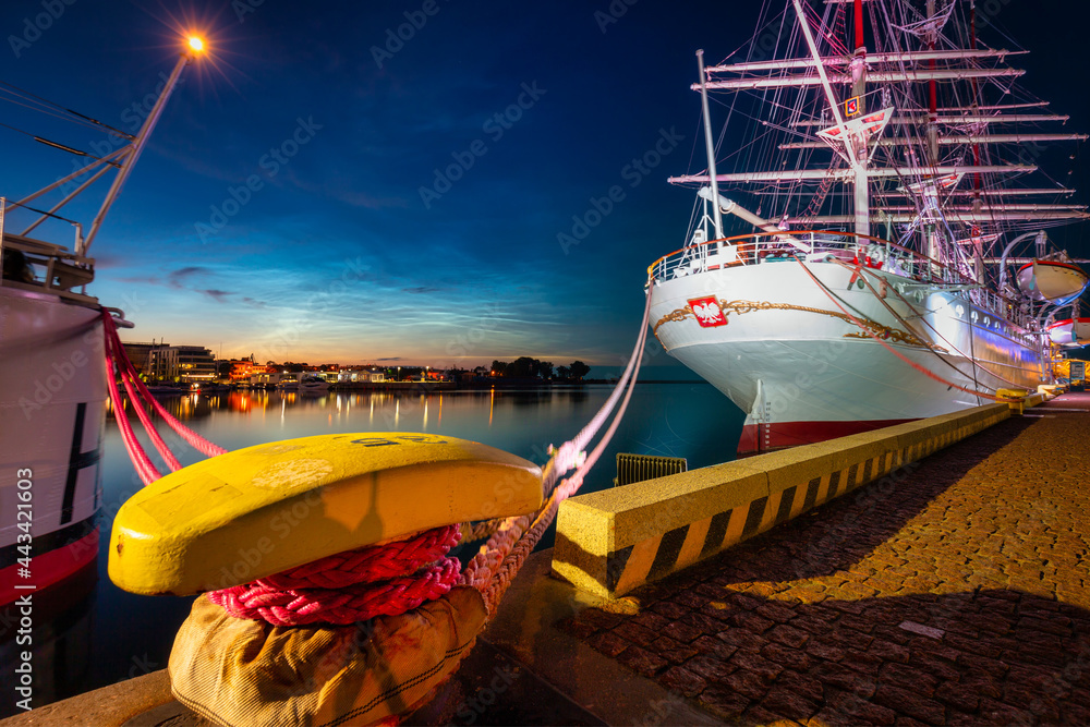 Fototapeta premium Night scenery in Gdynia with noctilucent clouds over the harbor. Poland