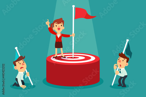 businesswoman holding flag on top of target winning against the competition