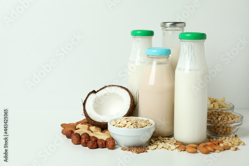 Concept of vegan milk on white background