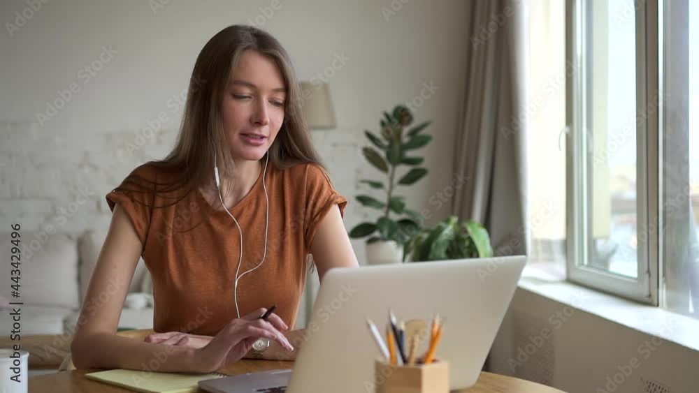 Woman entrepreneur communicate on video conference from home. Female freelancer make online call Woman entrepreneur communicate on video conference from home. Female freelancer make online call
