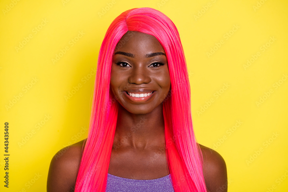 Portrait of optimistic nice pink hairdo lady wear purple top isolated on vivid yellow color background Portrait of optimistic nice pink hairdo lady wear purple top isolated on vivid yellow color background