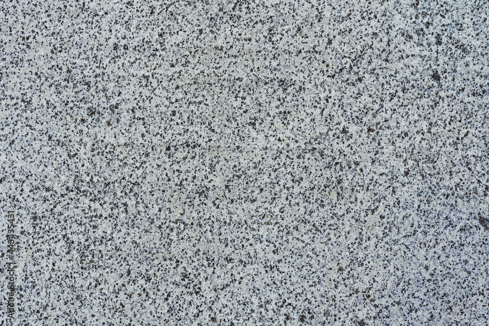 Texture of gray granite stone with crumbs. Seamless background Texture of gray granite stone with crumbs. Seamless background