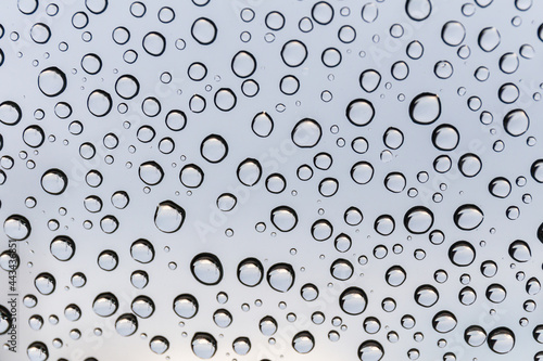 Drops of water on the windshield when it rains. Select focus
