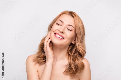 Photo portrait woman touching cheeks smooth skin smiling overjoyed isolated white color background