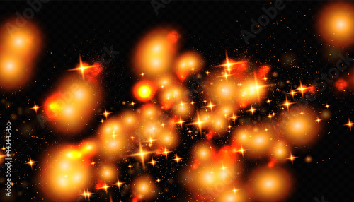 The dust sparks and golden stars shine with special light. Vector sparkles on a transparent background. Christmas light effect. Sparkling magical dust particles.