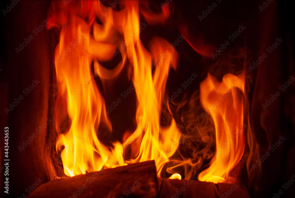 Red tongues of flame on a black background. Red tongues of flame on a black background.