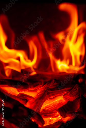 Red tongues of flame on a black background.