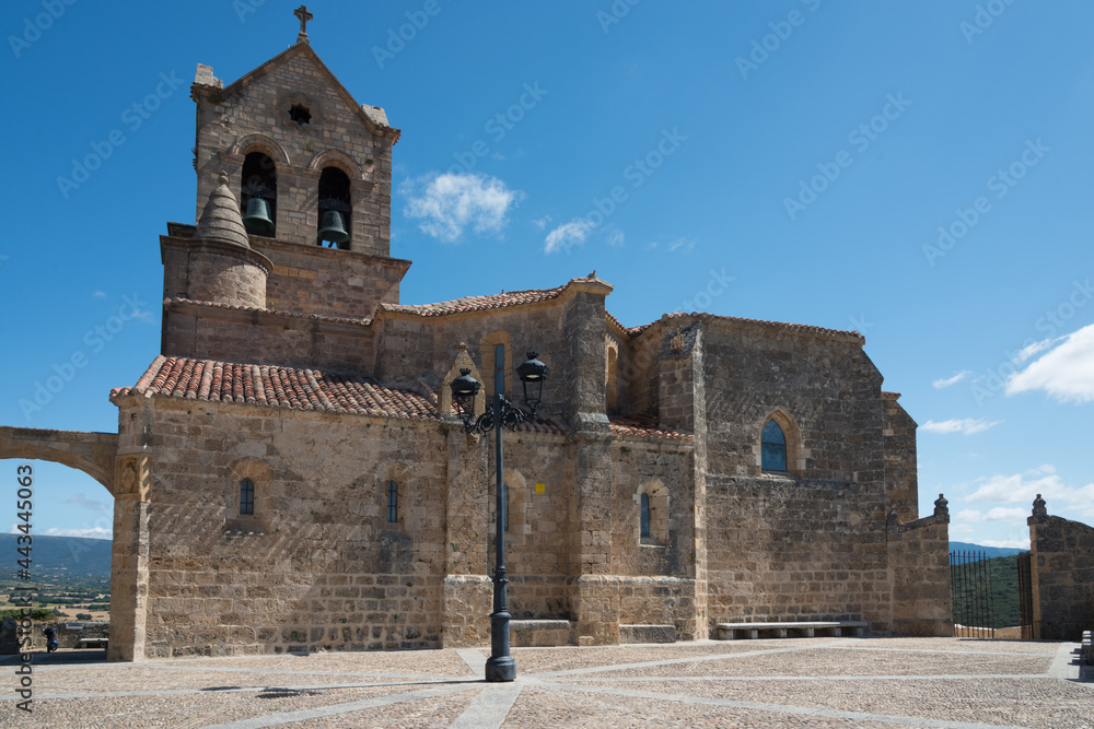 Ancient Church of San Vicente and San Sebastian and square in front of it. Blue sky, no people. Frias, Burgos, Merindades, Spain, Europe