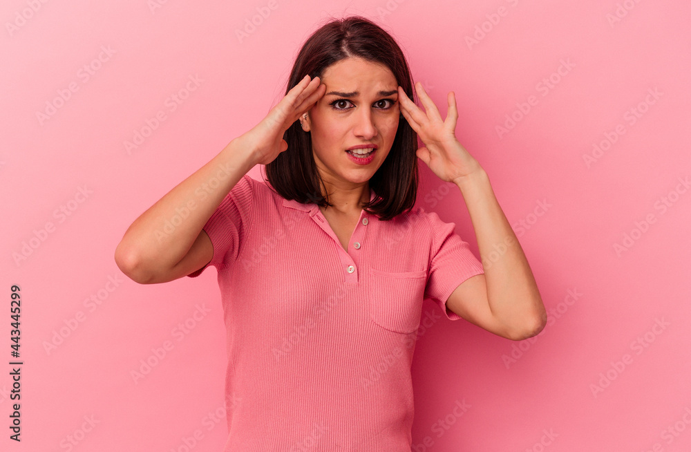 Young caucasian woman isolated on pink background receiving a pleasant surprise, excited and raising hands. Young caucasian woman isolated on pink background receiving a pleasant surprise, excited and raising hands.