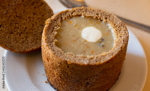 aromatic traditional hot chowder in a bowl of rye bread