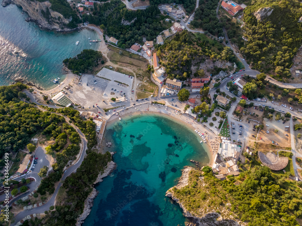 Beautiful aerial view on mediterranean village in Greece. Greek island Corfu from air. A port and beach in Paleokastritsa