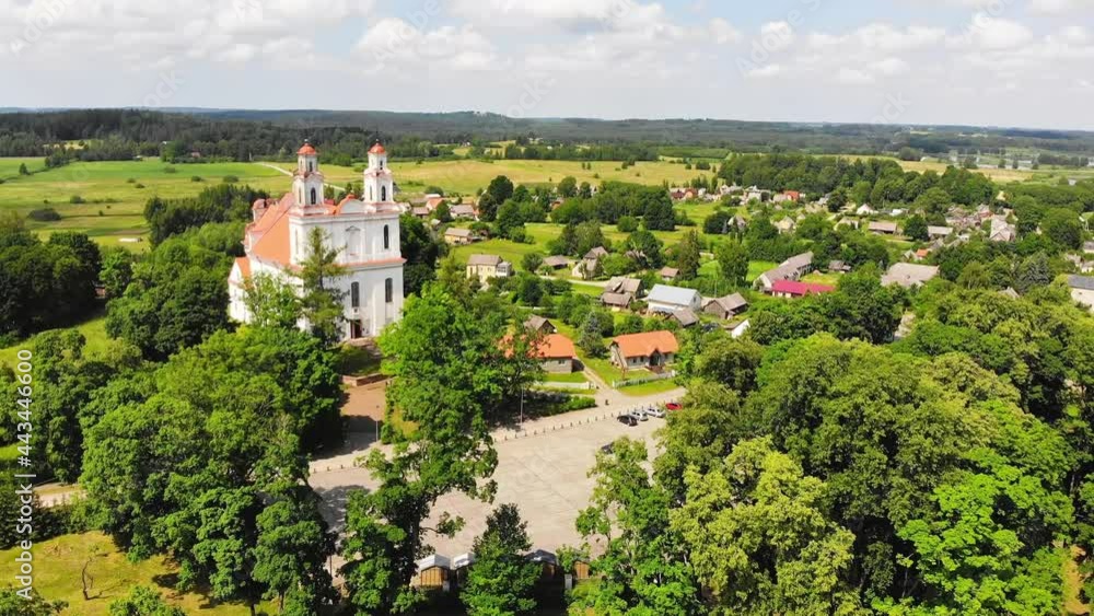 Aerial view St. Jacob the apostle church in Kurtuvenai town, with Lithuania countryside panorama background Aerial view St. Jacob the apostle church in Kurtuvenai town, with Lithuania countryside panorama background
