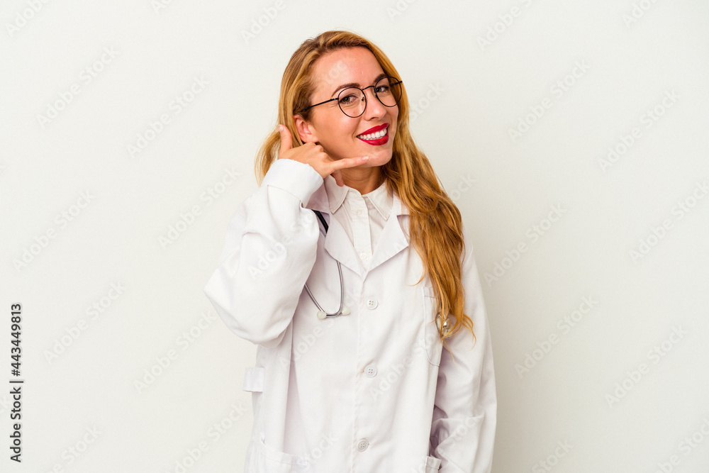 Caucasian doctor woman isolated on white background showing a mobile phone call gesture with fingers.