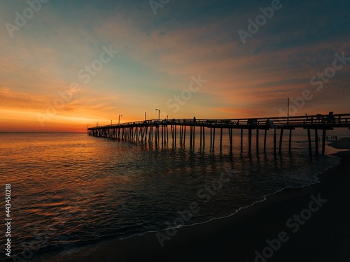 Nags Head Pier at sunrise, in the Outer Banks, North Carolina © jonbilous