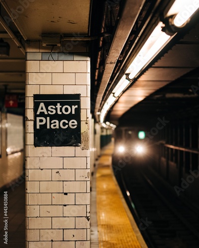 A train pulling into Astor Place Subway Station, East Village, New York City photo