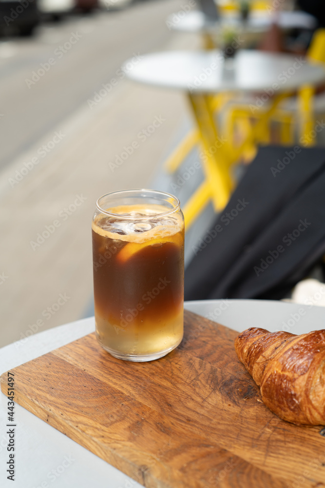 Breakfast with croissant and iced coffee Breakfast with croissant and iced coffee