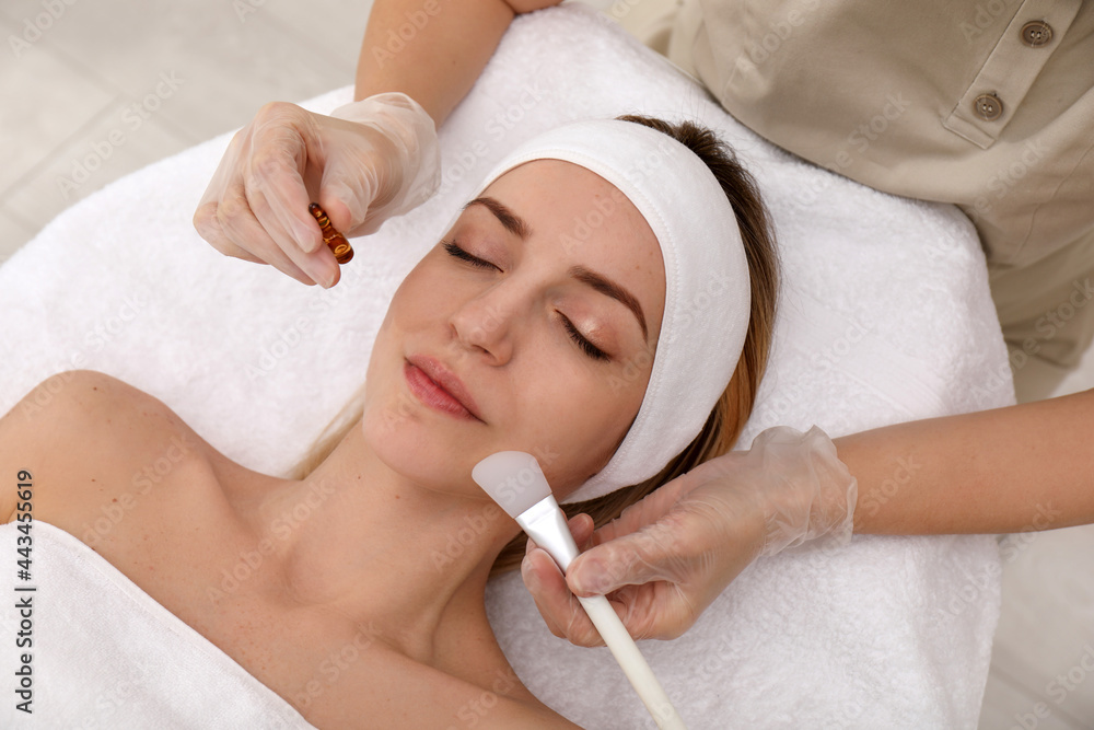 © New Africa - Young woman during face peeling procedure in salon © New Africa - Young woman during face peeling procedure in salon