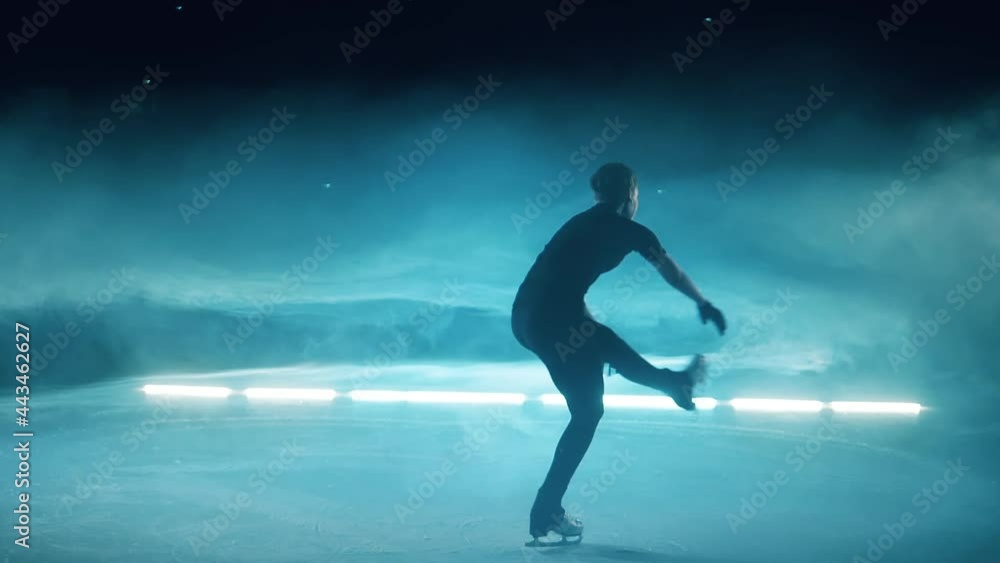 Slow motion of a figure skater spinning on the ice Slow motion of a figure skater spinning on the ice