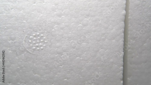 Texture of Expanded Polystyrene or EPS foam. Expanded Polystyrene foam is a product of styrene monomer. photo