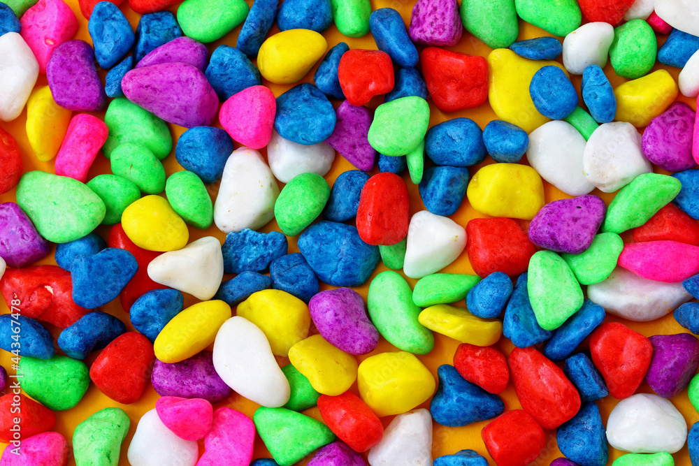 close-up colorful painted pebbles background close-up colorful painted pebbles background