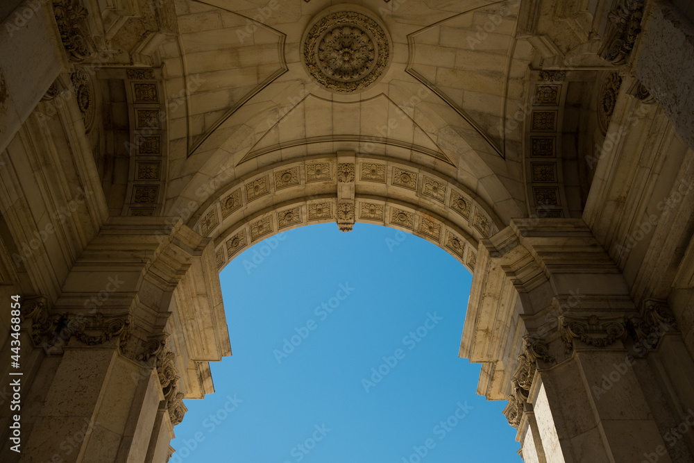 Lisbon, Portugal - 25-06-2021: detail of Rua Augusta arch from below with natural light. The landmark iconic Augusta Street Triumphal Arch in the Commerce Square, Praca do Comercio or Terreiro do Paco