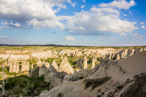 Amazing Volcanic rock formations known as Love Valley or Fairy Chimneys in Cappadocia  Turkey. Mushroom Valley one of attractions in Goreme National Park  Turkey. Mountains with rooms inside