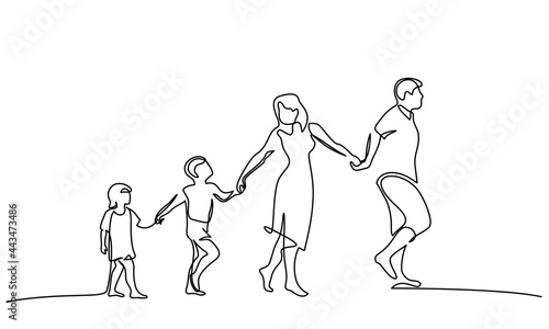 Family walking hand in hand. Dad, mom and two children