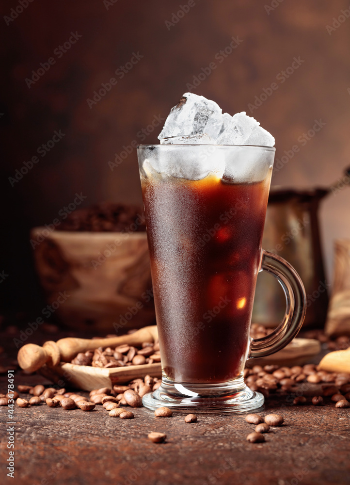 Ice coffee in frozen glass and coffee beans. Ice coffee in frozen glass and coffee beans.