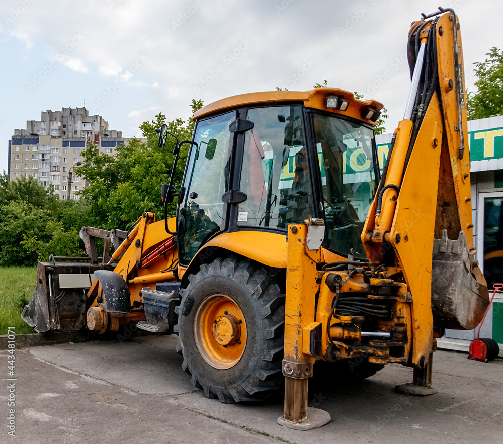 excavator change wheel at tire service without front wheel