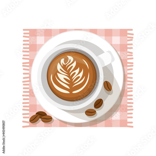 Cup of coffee with coffee beans on a platter.