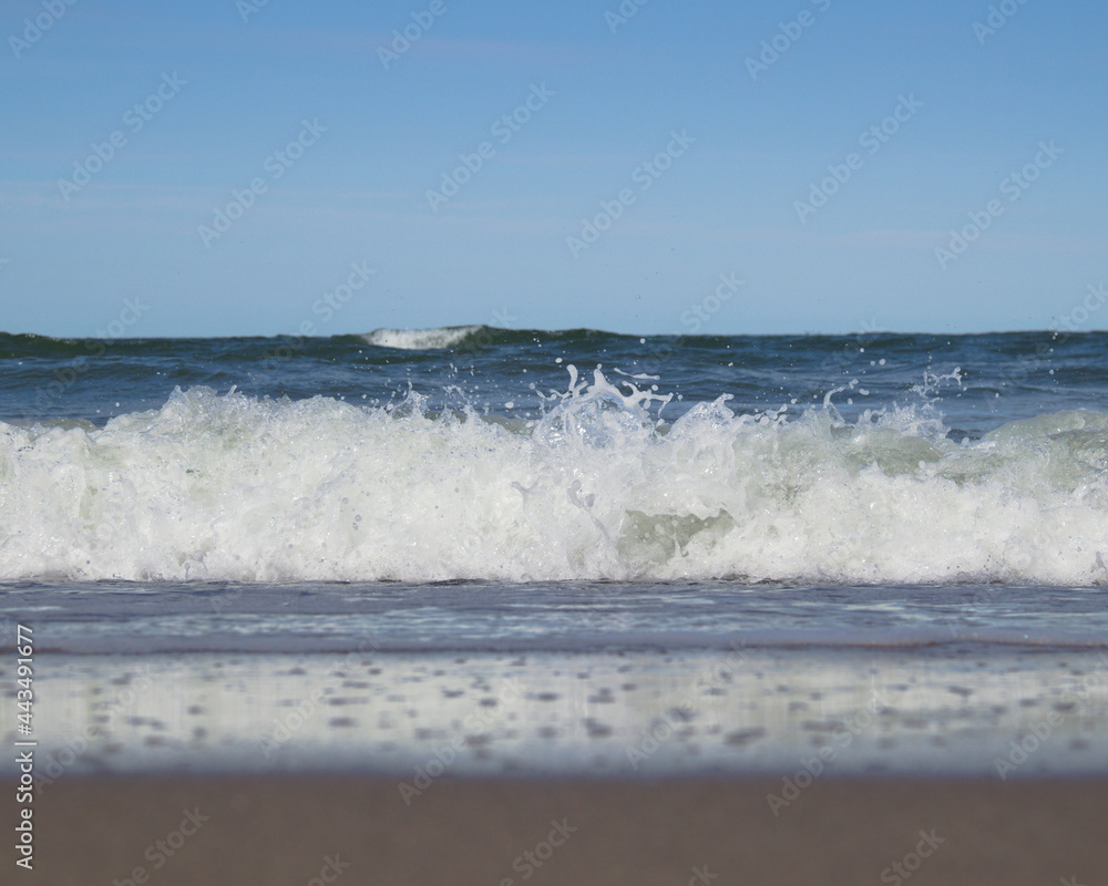 water splashing on beach
