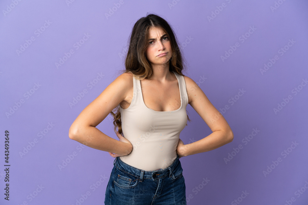 Young caucasian woman isolated on purple background angry Young caucasian woman isolated on purple background angry