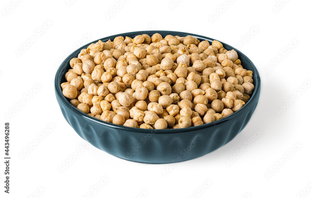 Dry chickpea beans in a blue ceramic bowl isolated on white background. Raw ingredient of vegetarian food and hummus and source of vegetable protein, carbohydrates, fats and dietary fibers. Dry chickpea beans in a blue ceramic bowl isolated on white background. Raw ingredient of vegetarian food and hummus and source of vegetable protein, carbohydrates, fats and dietary fibers.