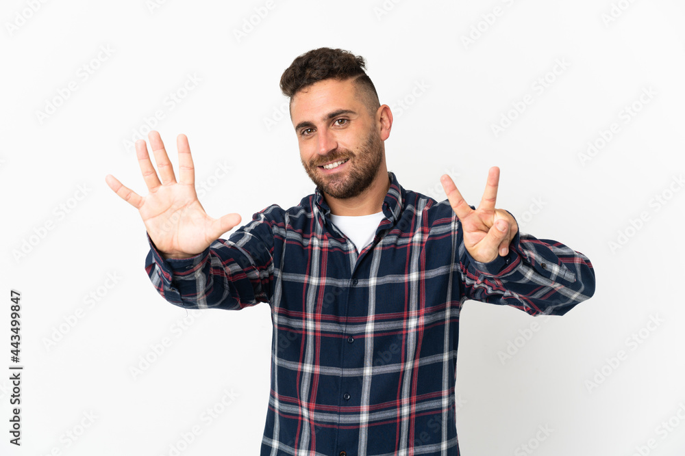 Caucasian man isolated on white background counting seven with fingers Caucasian man isolated on white background counting seven with fingers