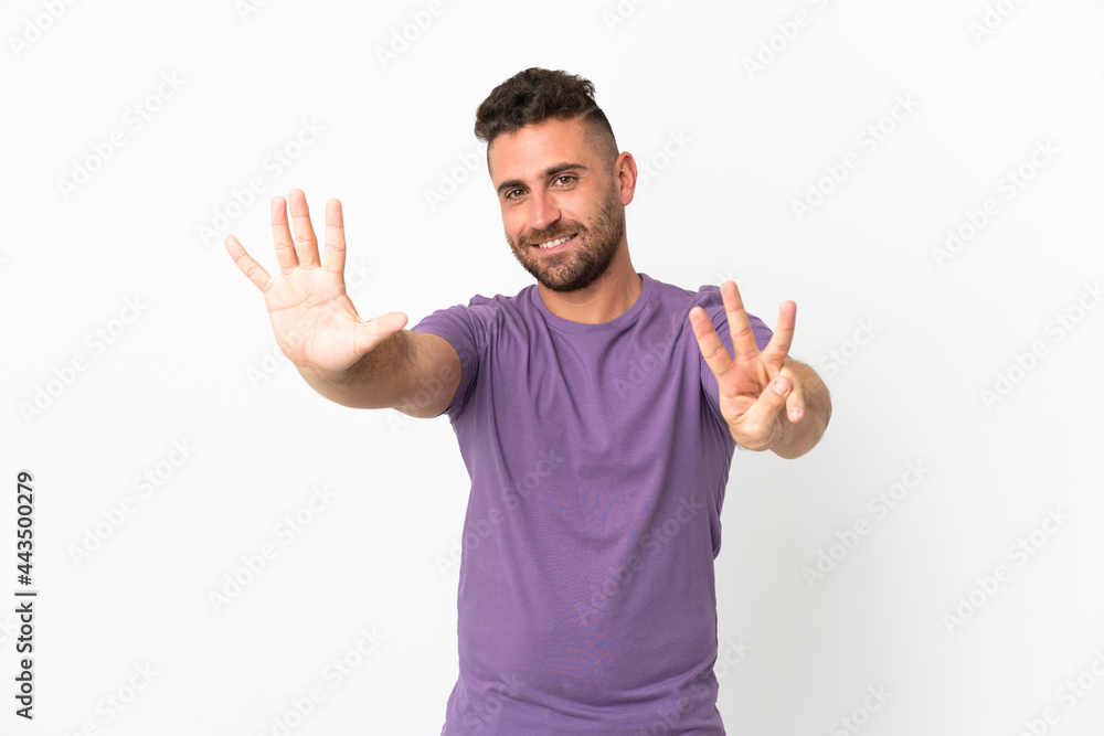 Caucasian man isolated on white background counting eight with fingers Caucasian man isolated on white background counting eight with fingers