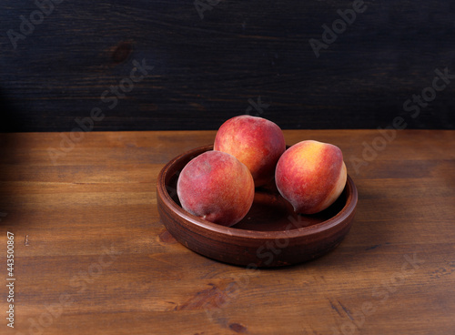 peaches in ceramic dishes