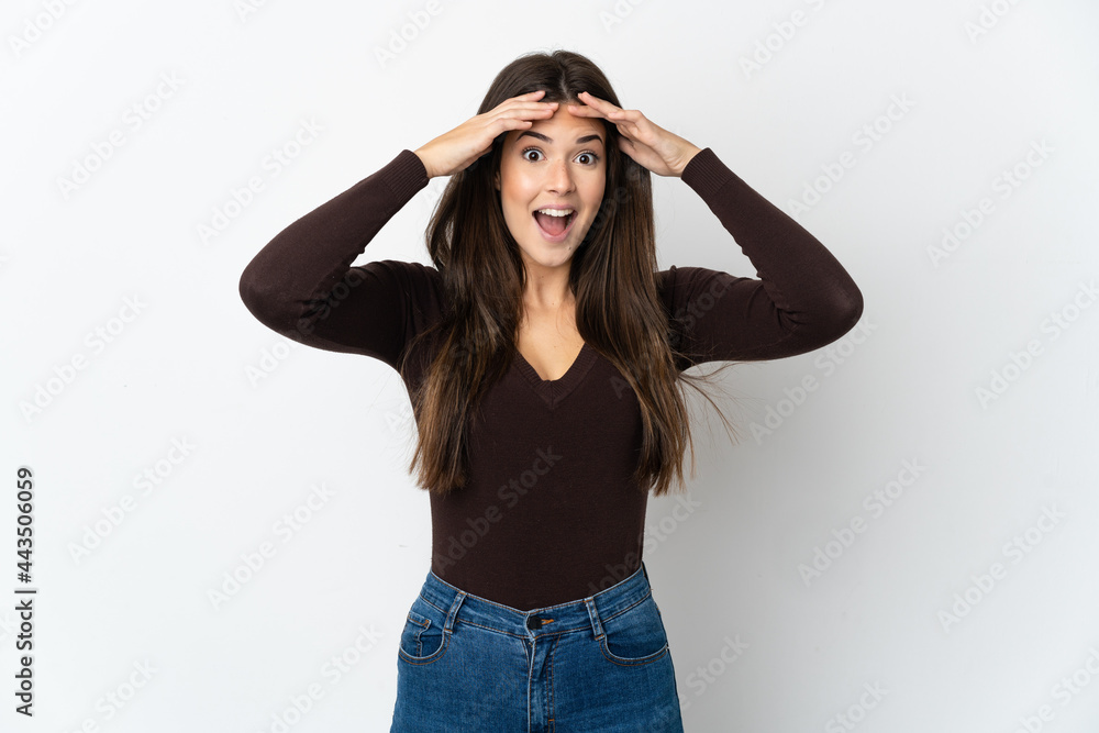 Teenager Brazilian girl isolated on white background with surprise expression Teenager Brazilian girl isolated on white background with surprise expression