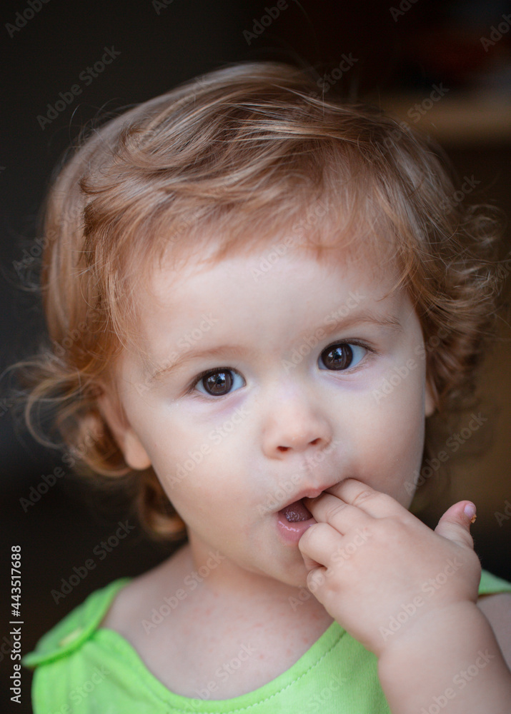 Portrait of a cute child baby. Close up caucasian kids face. Closeup head of funny kid. Portrait of a cute child baby. Close up caucasian kids face. Closeup head of funny kid.