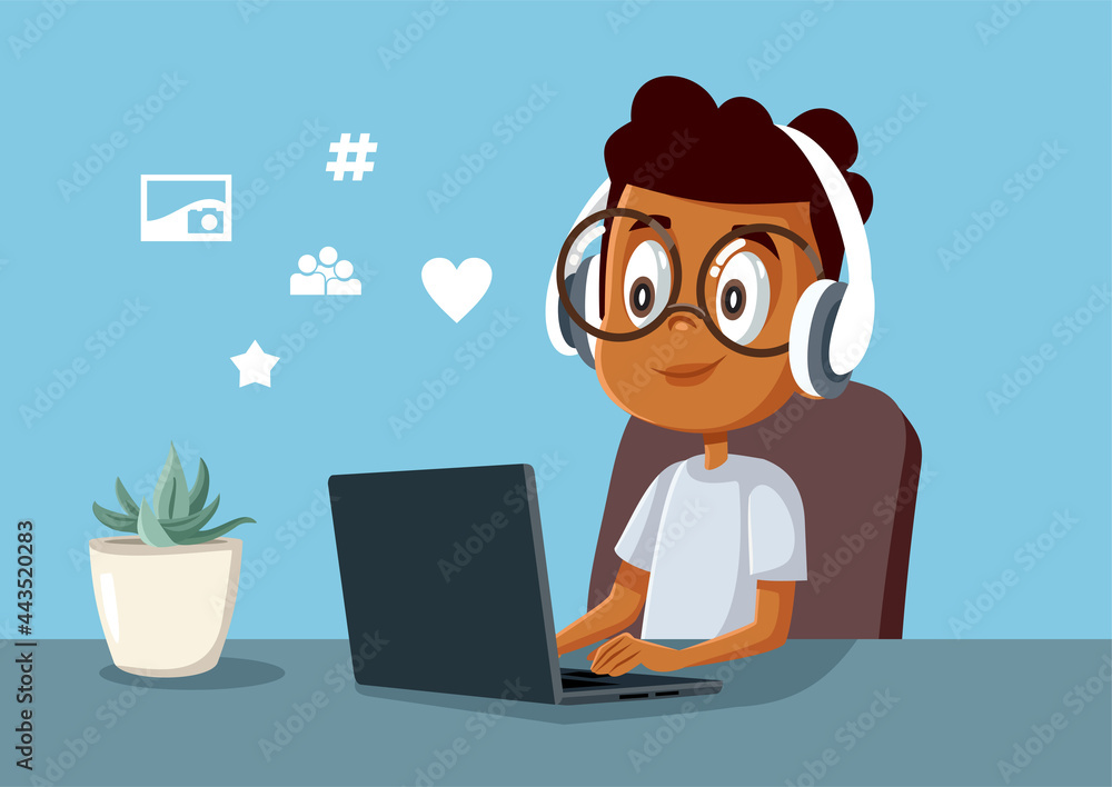 Young Boy Spending Time on Social Media on His Laptop Young Boy Spending Time on Social Media on His Laptop