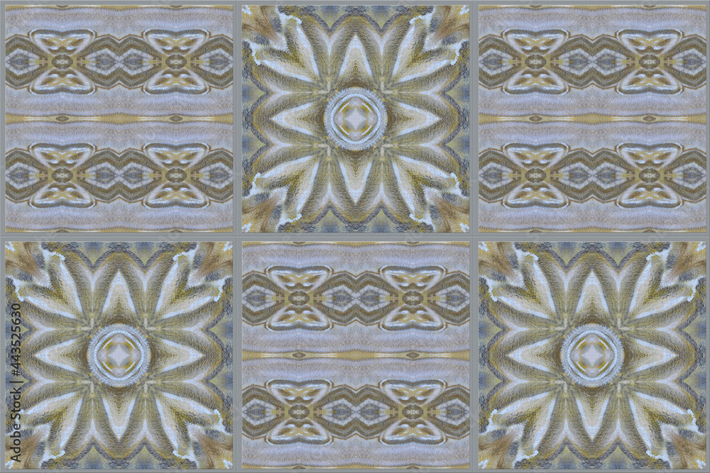 A panel of large tiles with an abstract ornament. Home interior decor (walls, wallpaper, linoleum, textiles).