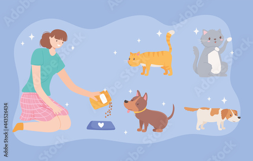 woman feeding pets
