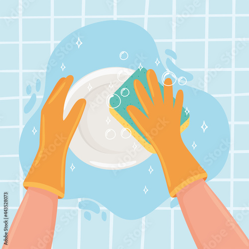 hands washing a dish