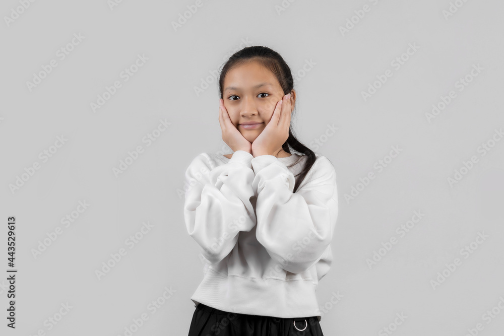 Asian little girl studio portrait on gray background Asian little girl studio portrait on gray background