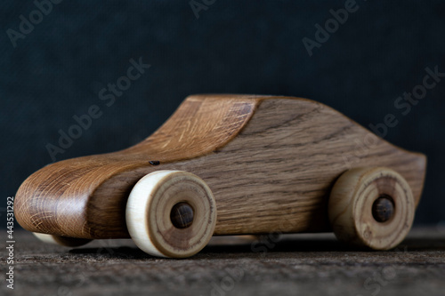 Toy car made of oak wood