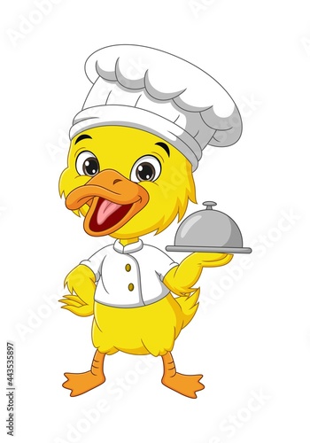 Cartoon little yellow duckling chef holding a silver tray